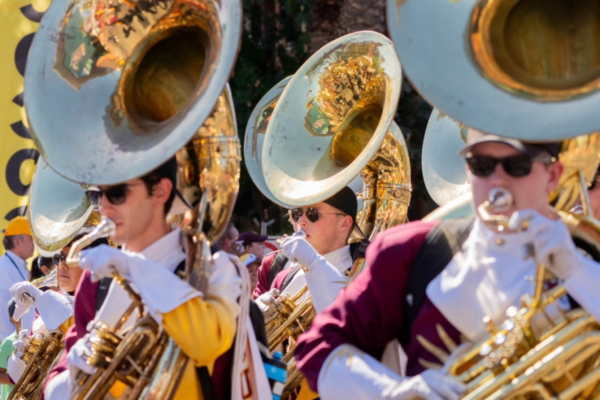 Marching band performing in ASU Homecoming Parade