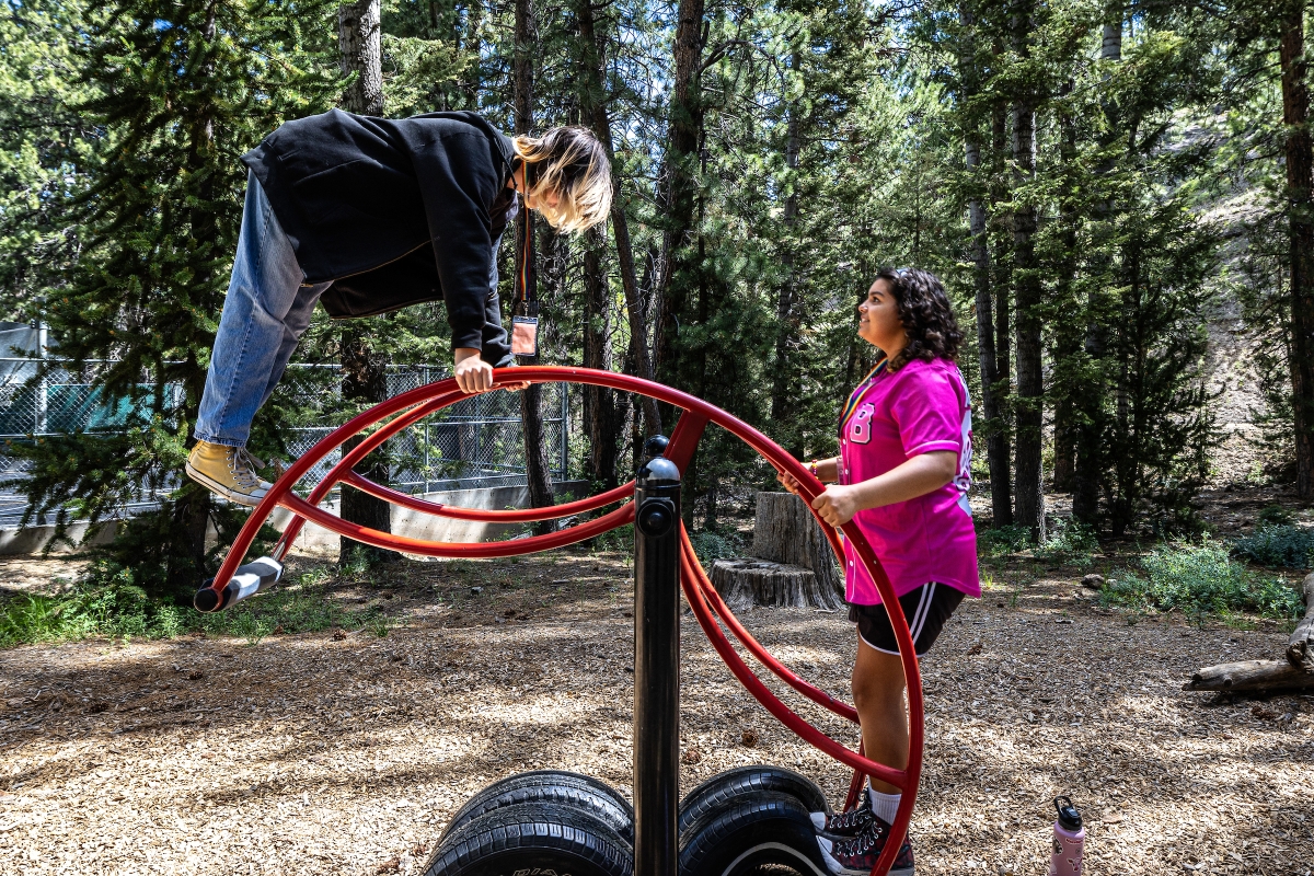 Kids playing on teeter totter during summer camp