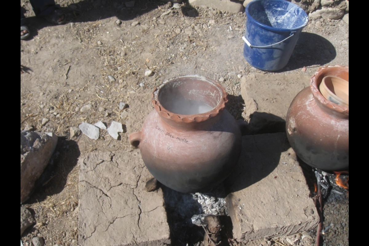 A pot with steam coming out.