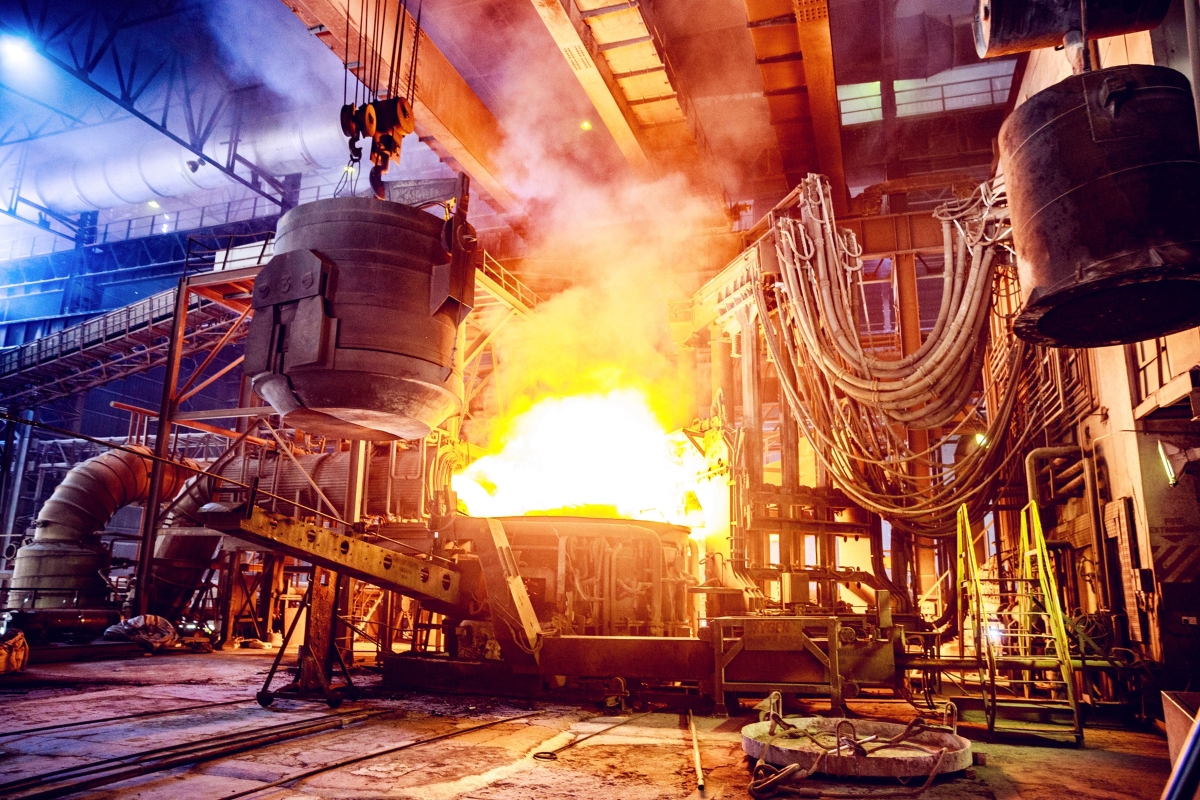 Scrap metal being poured into an electric arc furnace
