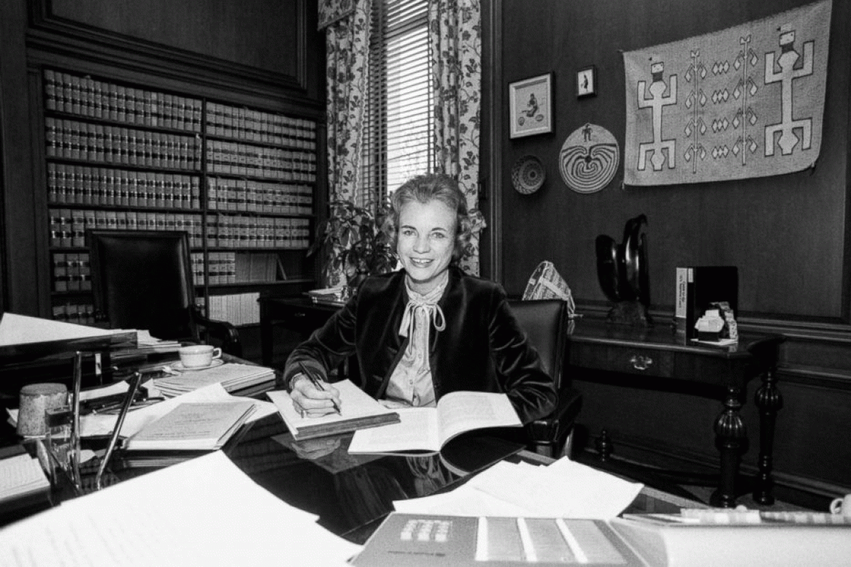 Sandra Day O'Connor in her office in an old black and white photo
