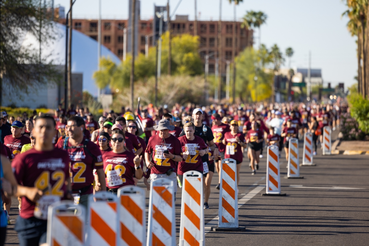 Large group of race runners on Tempe street