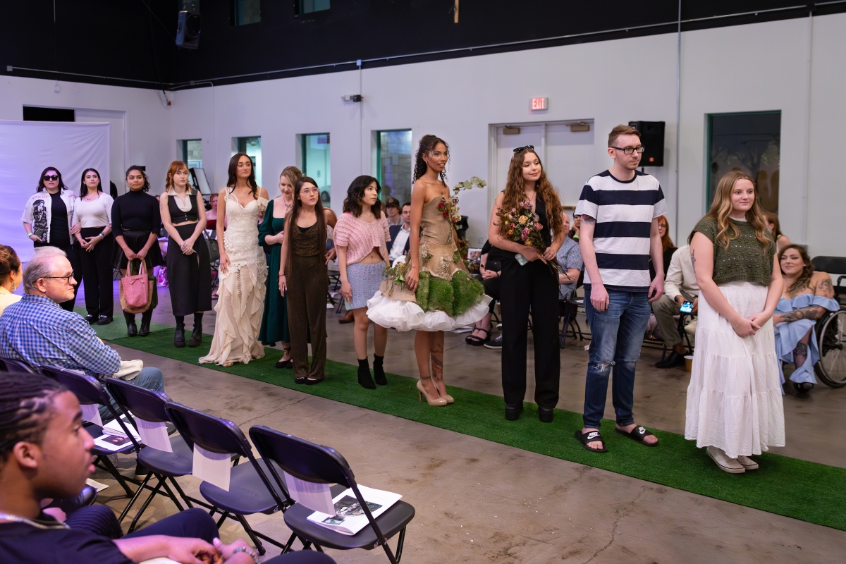 Students lined up on a runway