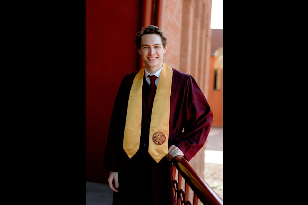 Lucas Barduson ASU headshot dressed in graduation regalia 