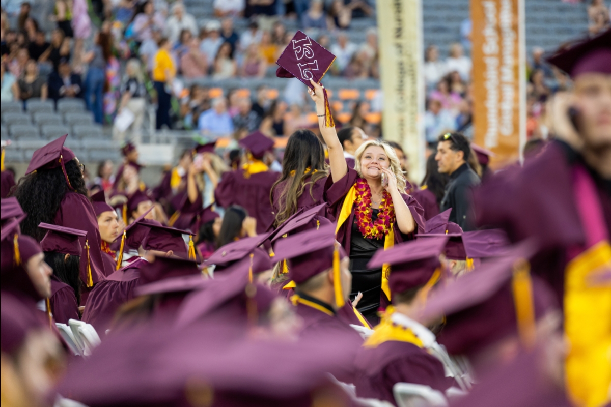 ASU graduate waves to family from field at commencement