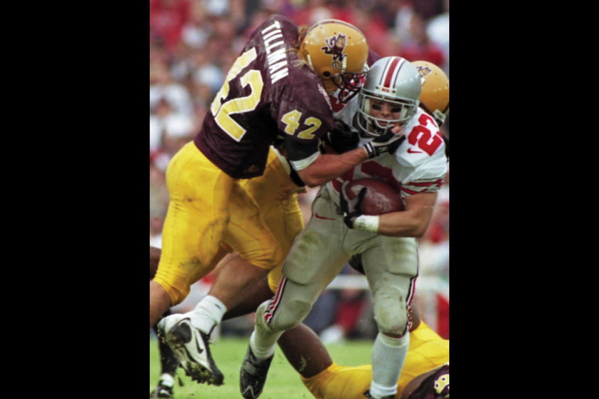 Pat Tillman tackling another player during an ASU football game