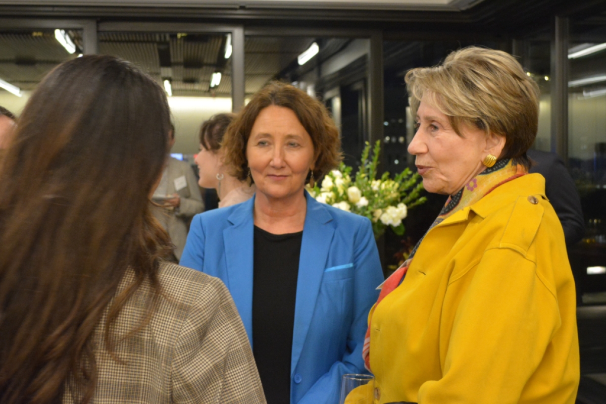 Stacy Leeds and Barbara Barrett talk to two other women