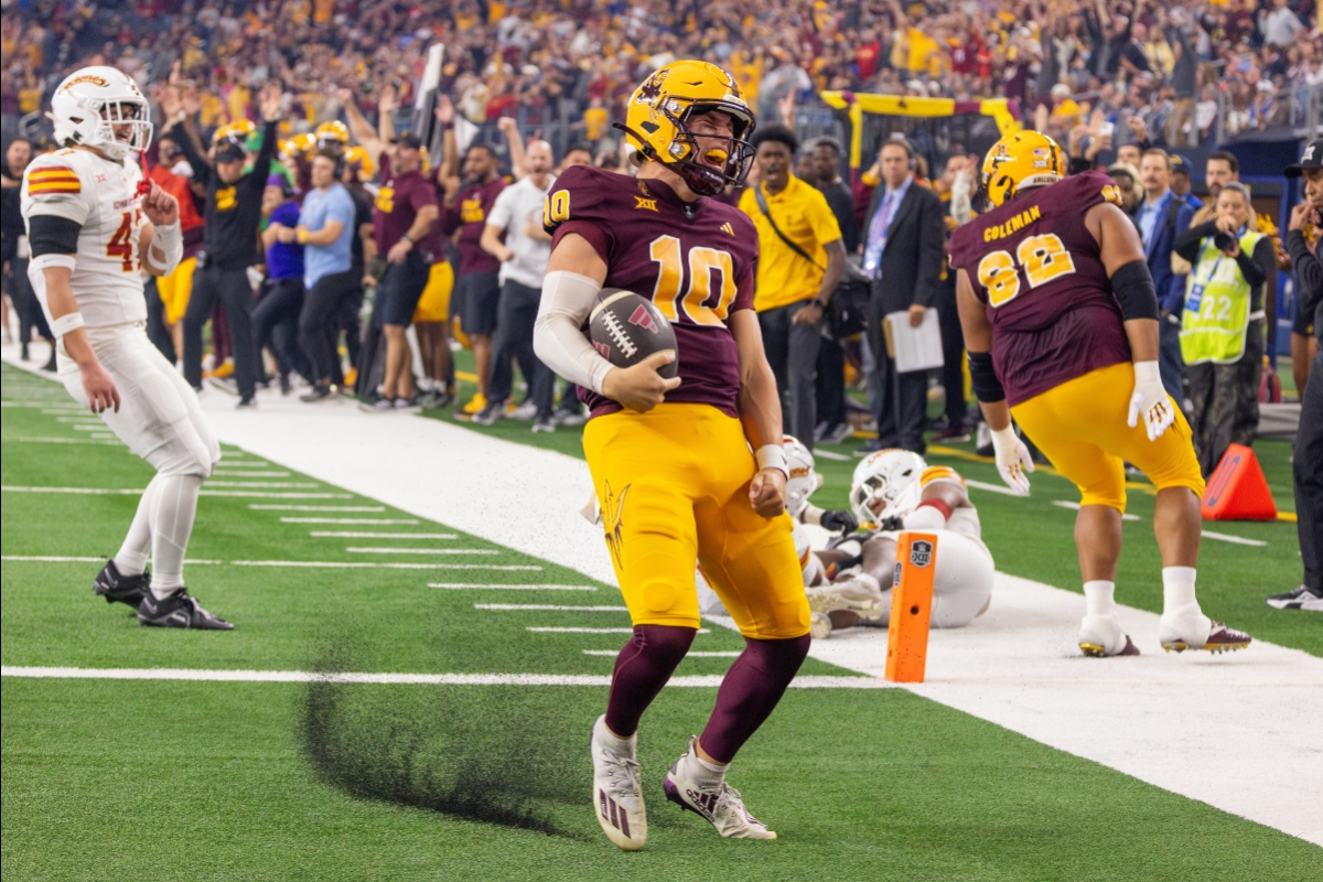 ASU football player skids to a stop on the field