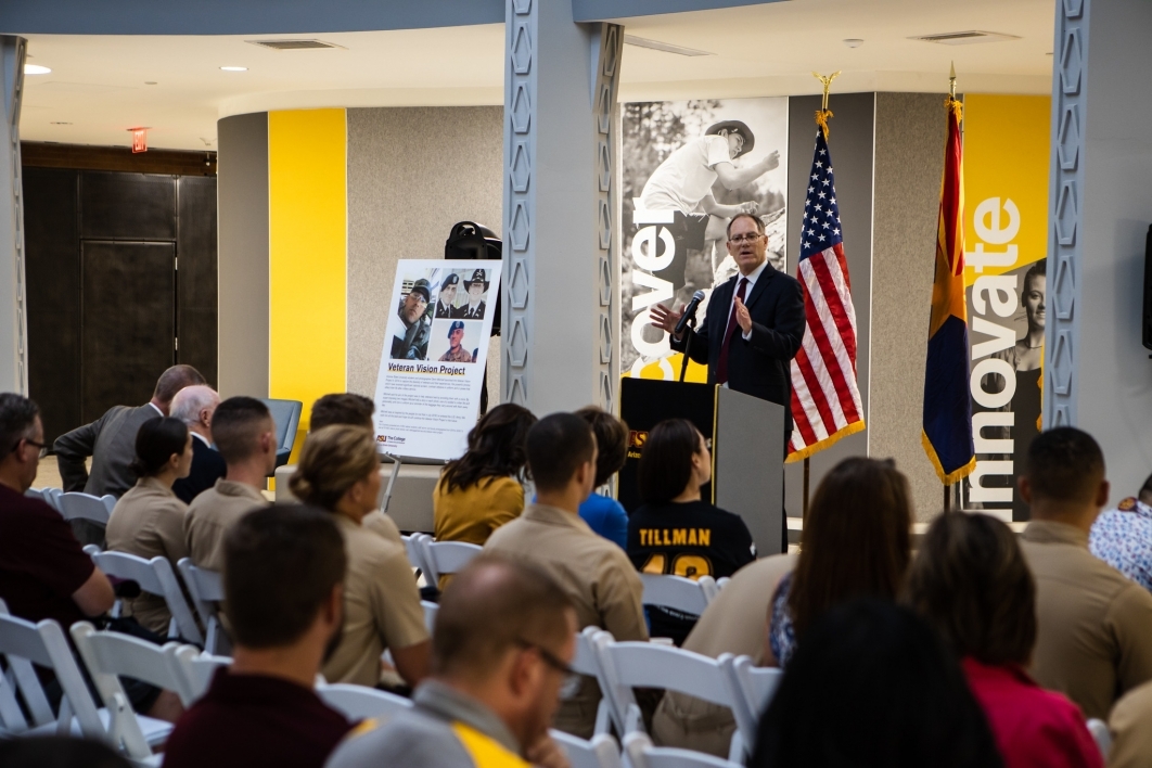 Dean of The College of Liberal Arts and Sciences Patrick Kenney speaks to an audience of students, faculty and veterans during an event at Armstrong Hall Nov. 8.