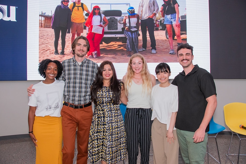 Ballesteros (third from left) with a team of her T-bird classmates speaking about the opportunity to work with Habanero Foods in Dubai for their Global Challenge Lab experience.