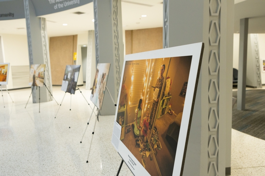 Photographs from the "Veteran Vision Project" set up in Armstrong Hall Rotunda. 