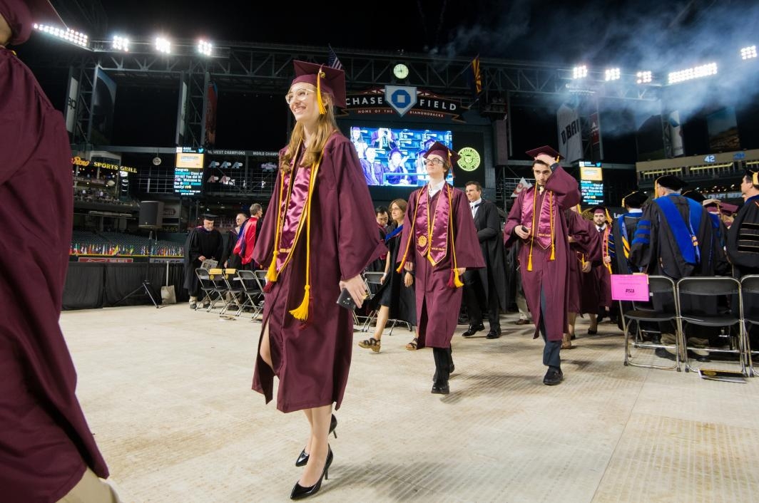 students exiting graduation