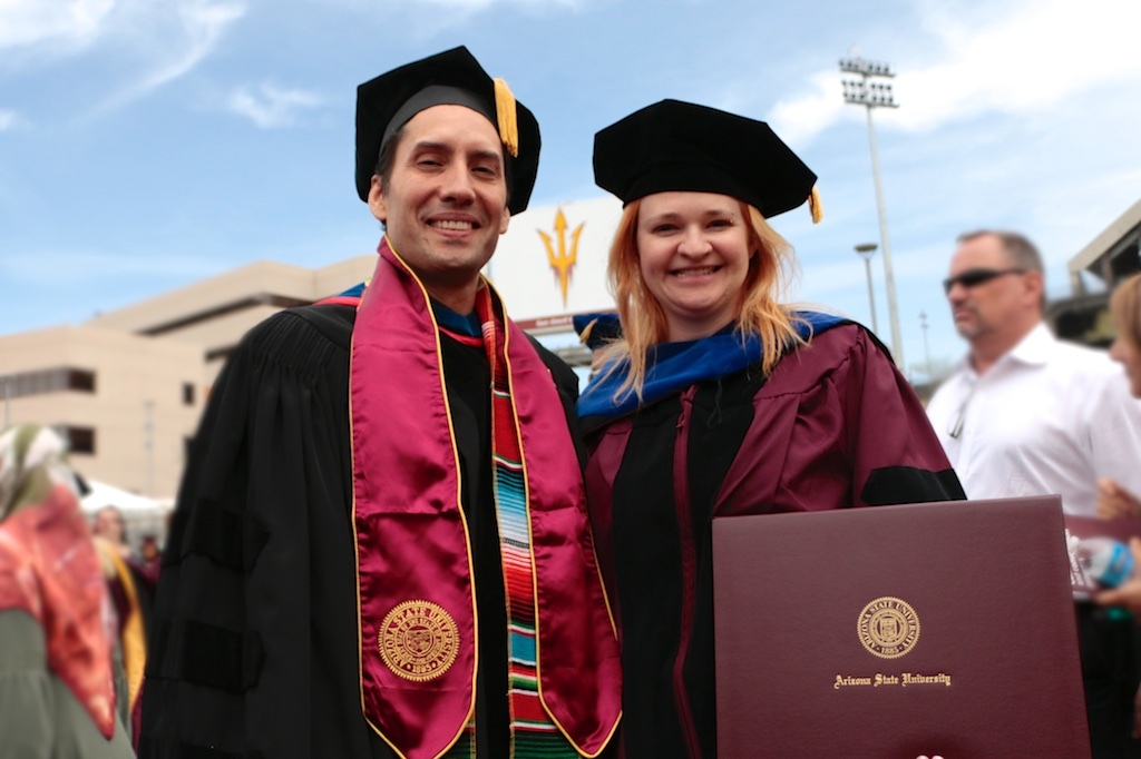 Wendy Caldwell celebrates with her advisor, Stephen Wirkus, after ASU Graduate Commencement