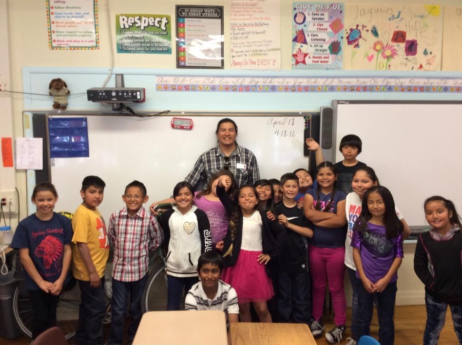 ASU master's student Kenny Dyer-Redner with a class of Native students