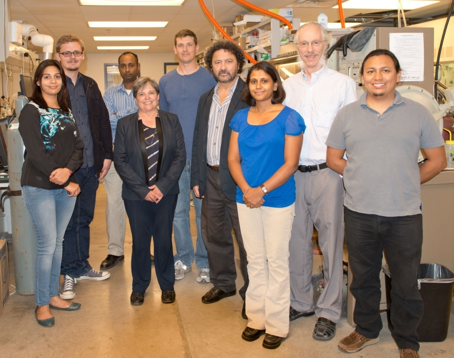 Group photo of ASU faculty, including Professor Dan Buttry, in a lab.