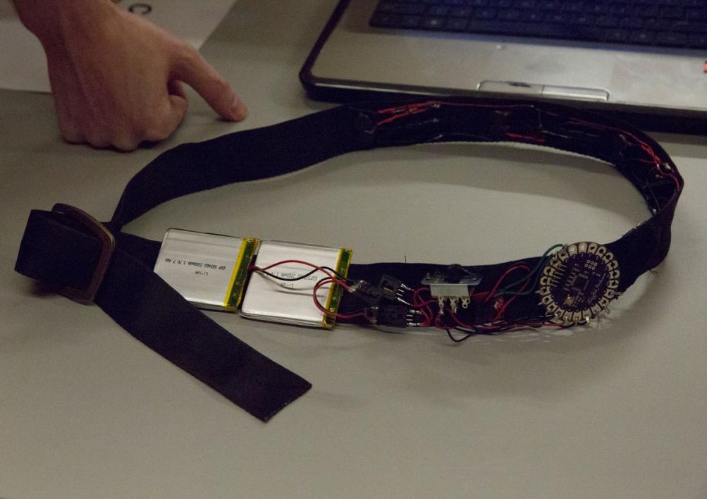 The Haptic Compass Belt was developed by undergraduate computer science students Dylan Ryland and Alejandra Torres and graduate software engineering student Dhanya Jacob.