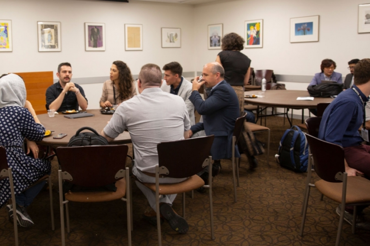 IEEE Brain 2019 Neurotech Entrepreneurs Workshop participants sit at tables.