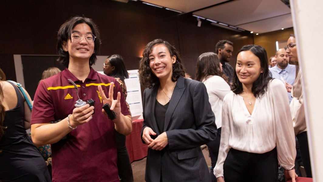 A group of ASU biomedical engineering students pose with a prototype of their capstone project at the Spring 2023 Capstone Showcase event.