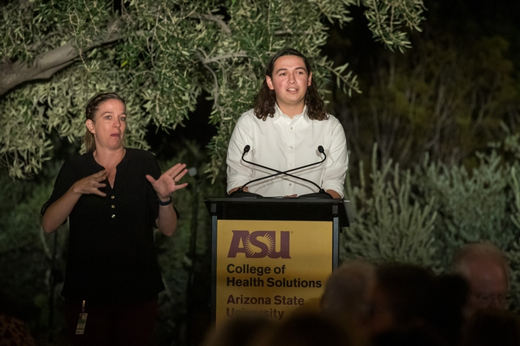 ASU College of Health Solutions student Christian Leo (right) speaks during the Celebration of Health event.