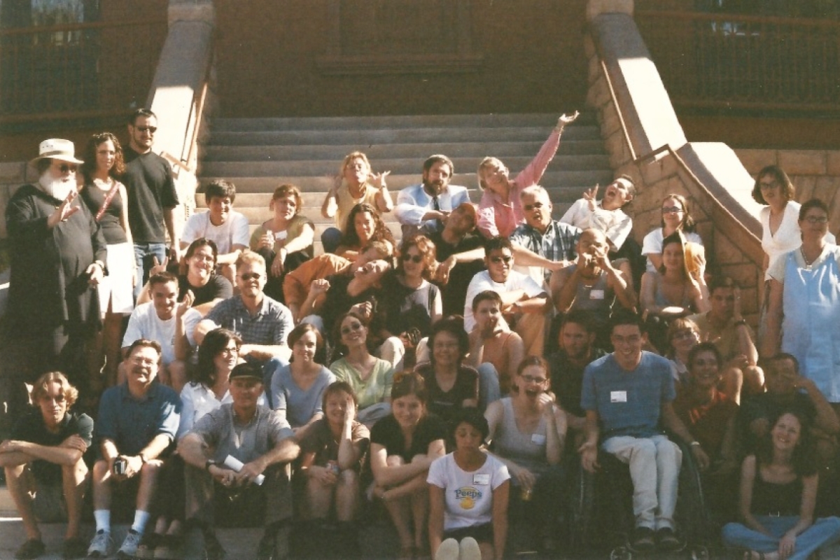 group of students and faculty on steps of building
