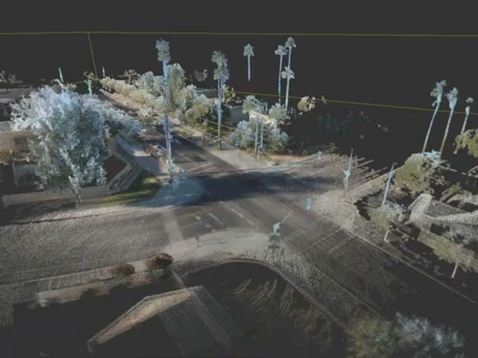 A rendering of a 3D digital environment of an intersection in Tempe using the lidar laser scanning system deployed by Thomas Czerniawski's research team.