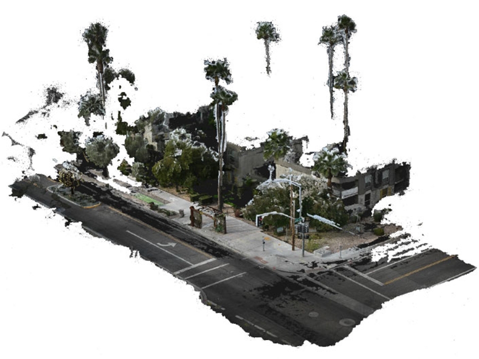 A figure depicting a digital 3D environment of an intersection in Tempe.