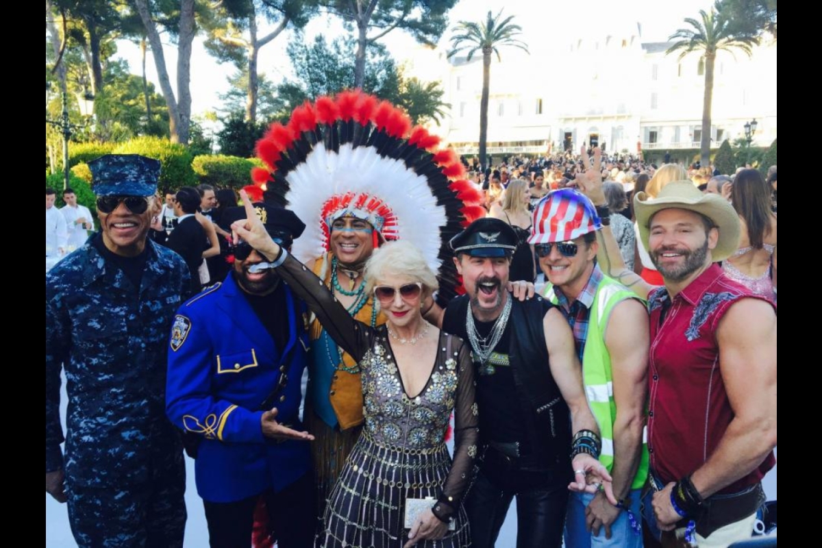 Eric Anzalone and members of Village People pose with Dame Helen Mirren in Antibes, France during Cannes 2016. / Courtesy photo