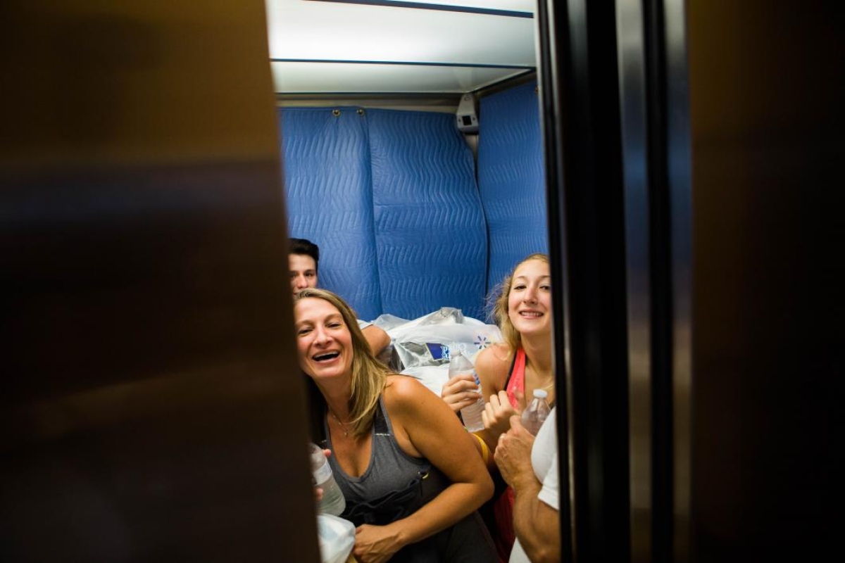 Freshman Hannah Kiesling laughs in the elevator with her family