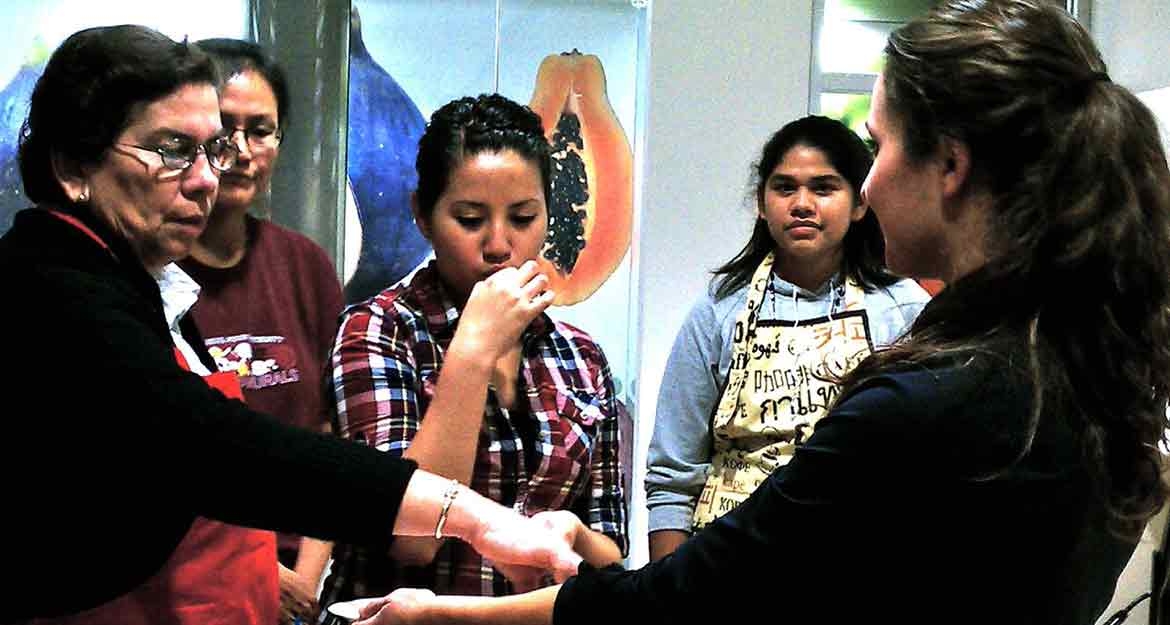 Community members participate in CENAS program in ASU kitchens downtown. Photo courtesy of Tamara Underiner.