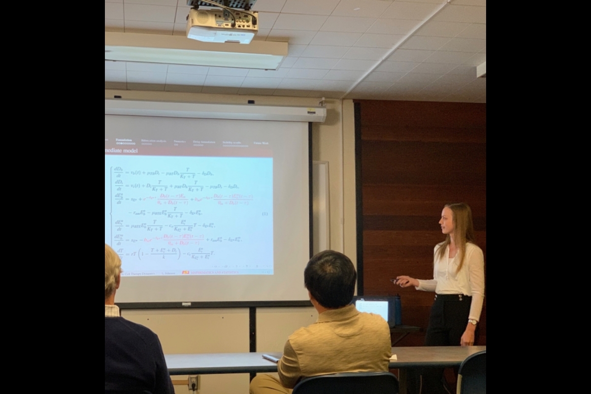 Lauren Dickman giving talk at math bio seminar