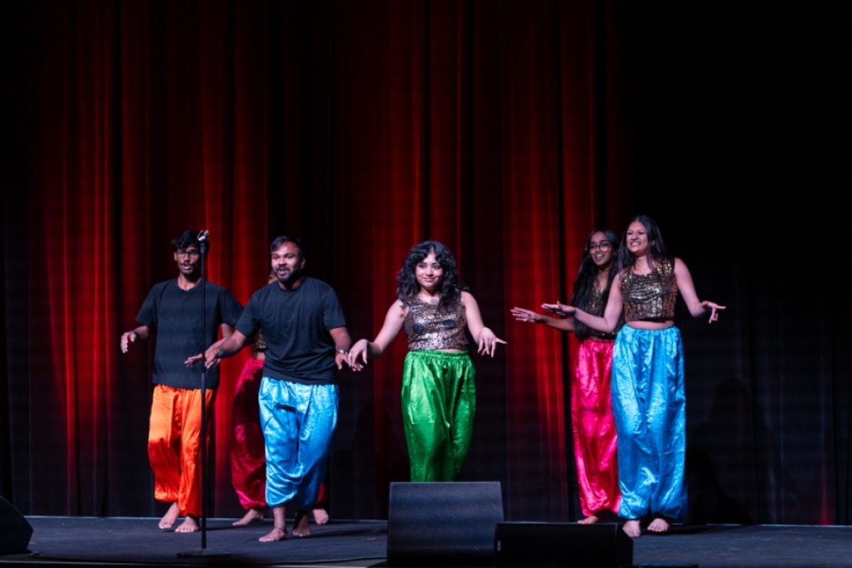 Bollywood dancers onstage.
