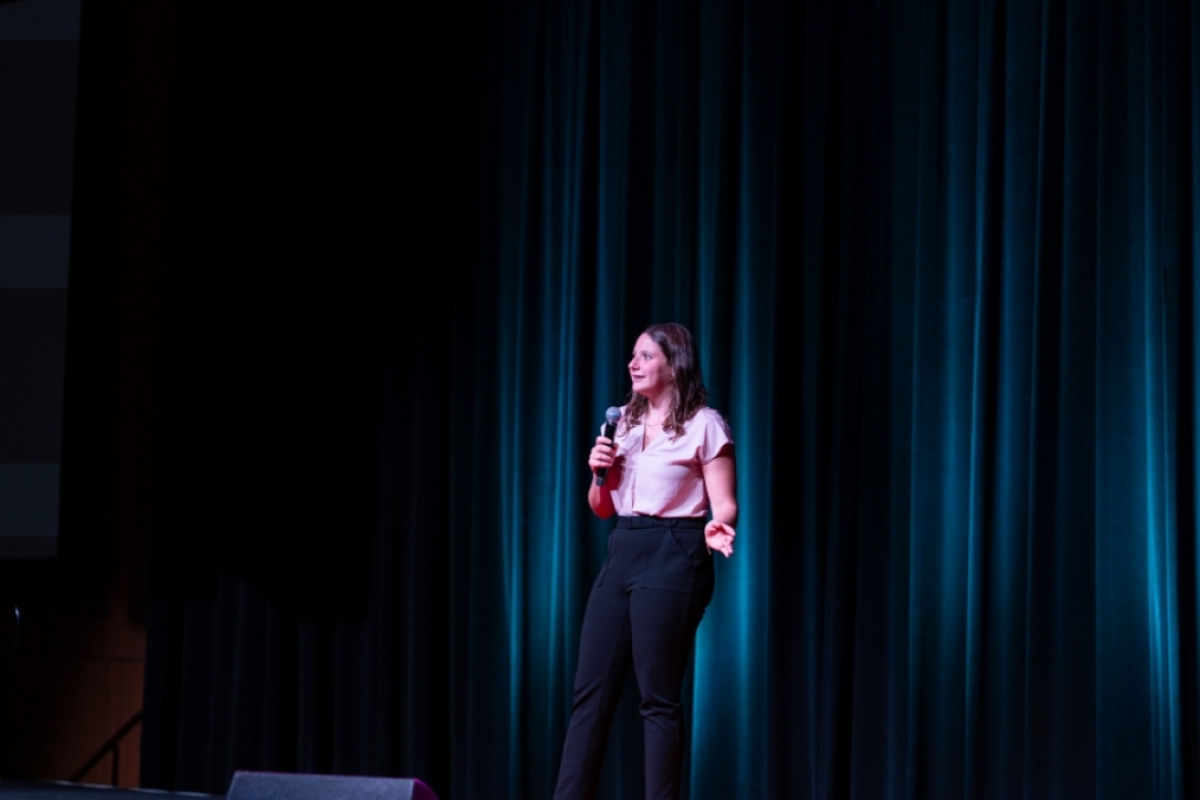 Student speaking onstage.