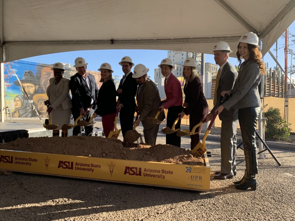 A group photo with shovels at a ground breaking