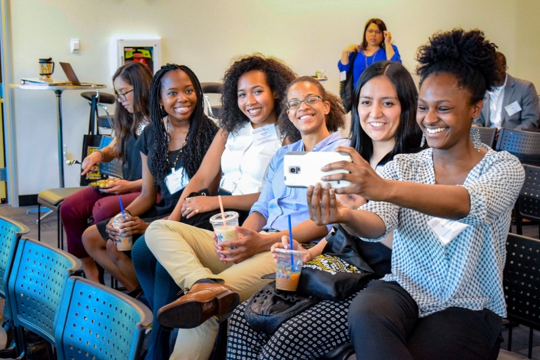 Women gather for a group photo during Women of Color STEM Entrepreneurship conference