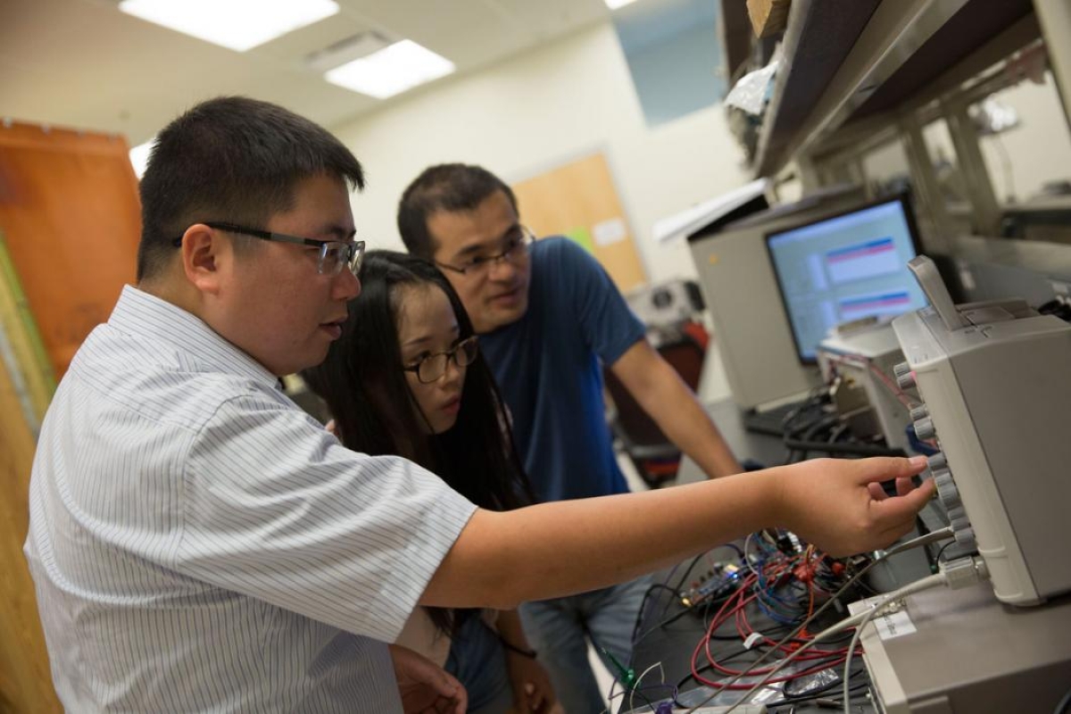 Assistant Professor Shimeng Yu (left) was recently awarded a National Science Foundation CAREER Award for his work related to neuro-inspired computing. He brings his expertise in higher-level computing architectures to help the team design neuromorphic ar