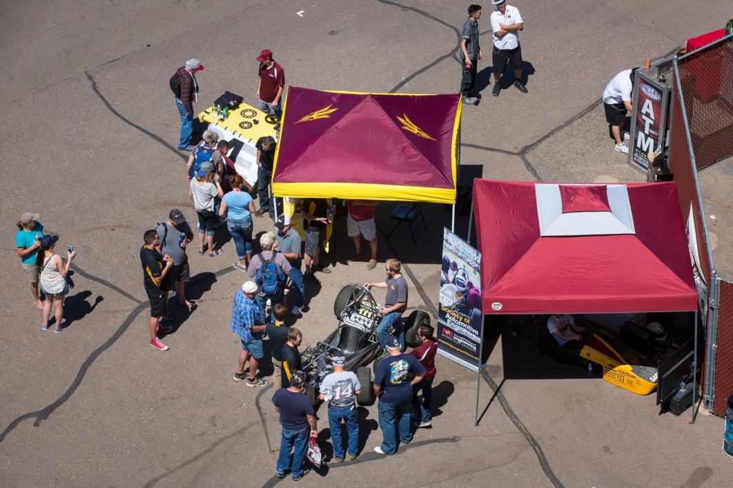 An aerial shot of the two tents of the motorsports team at PIR.