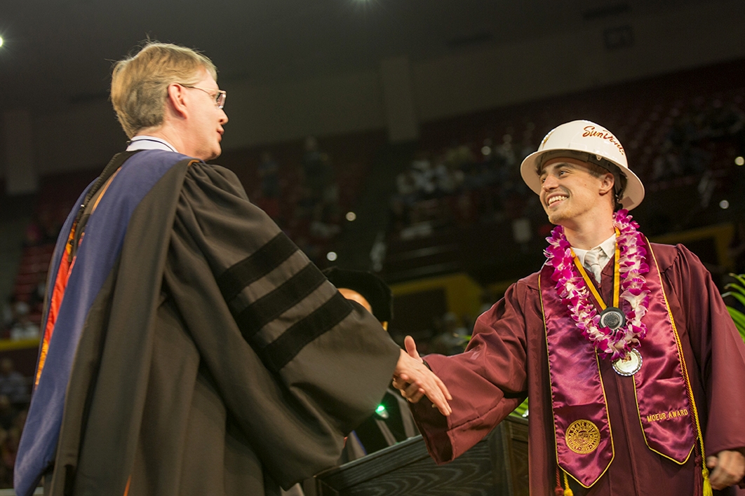 graduate shaking hands with dean