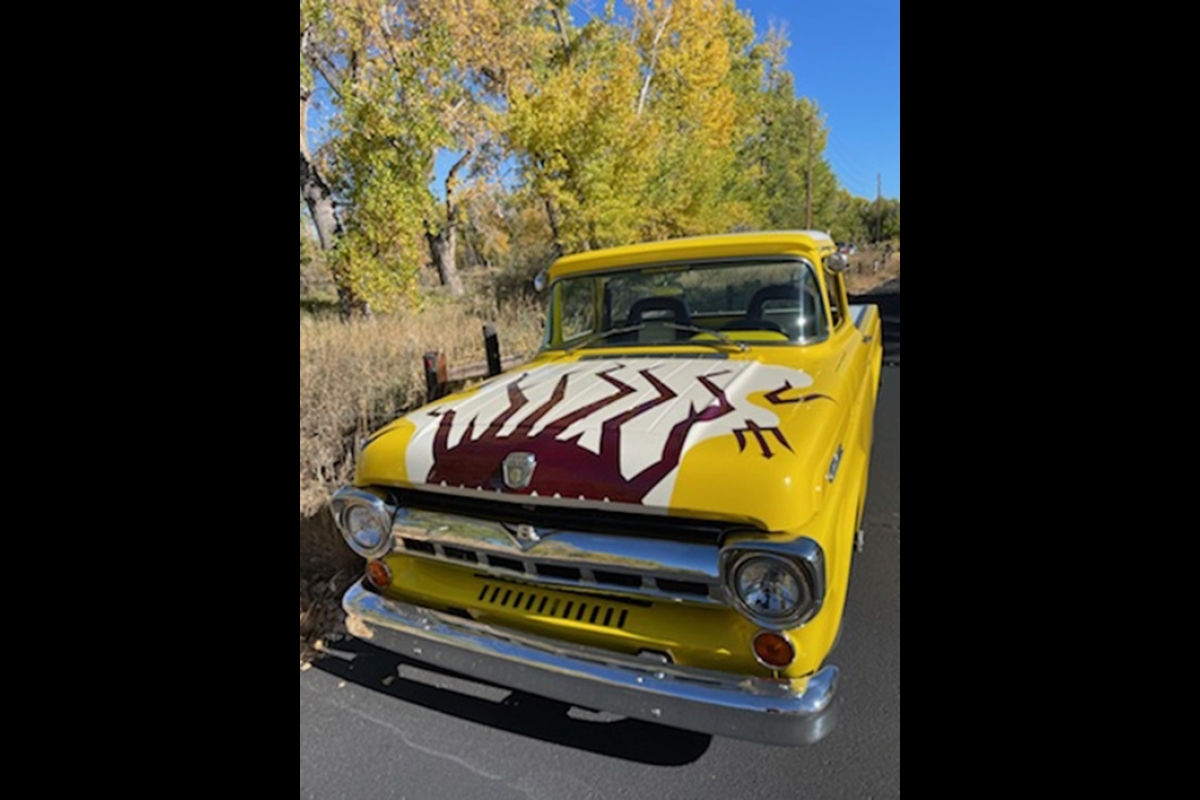 Maroon and gold vintage truck
