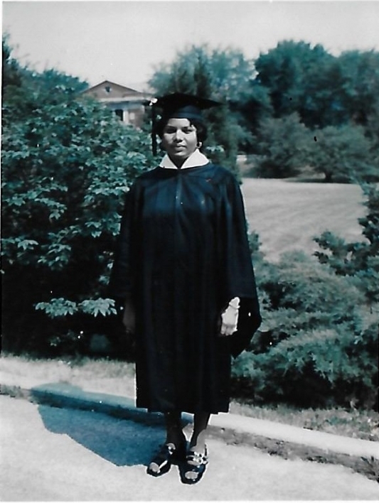Elsie Moore wearing a cap and gown on the day of her graduation from Elmhurst College in 1972.