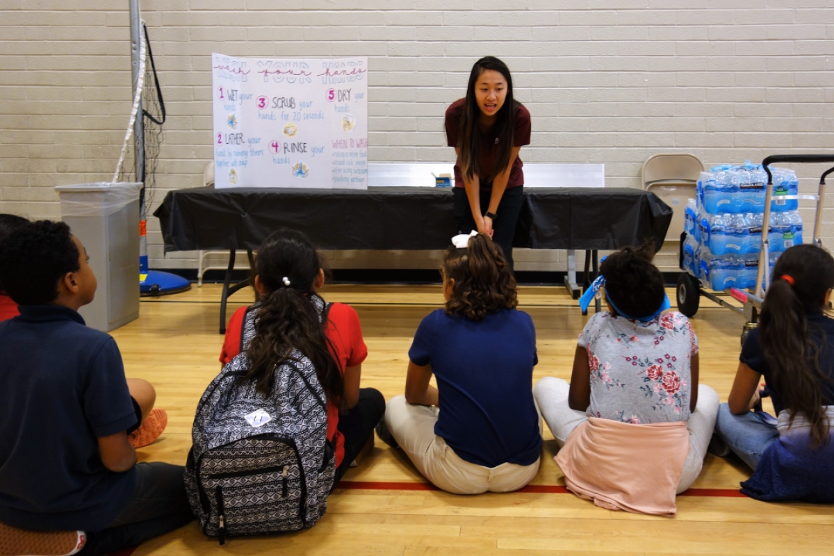 ASU nursing student Julie Nguyen talks about proper hand washing with elementary students