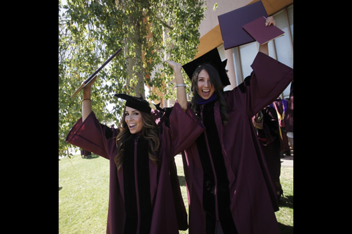 graduates celebrating