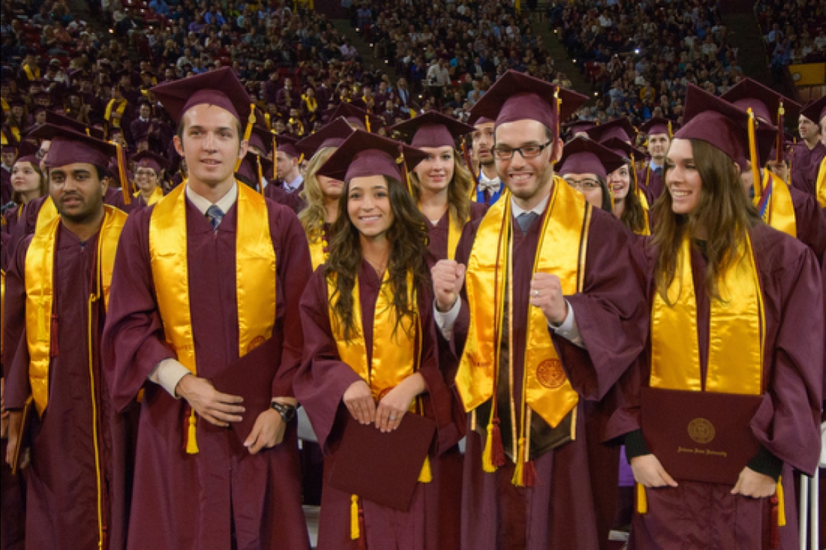 Mouer Award recipients standing at graduation