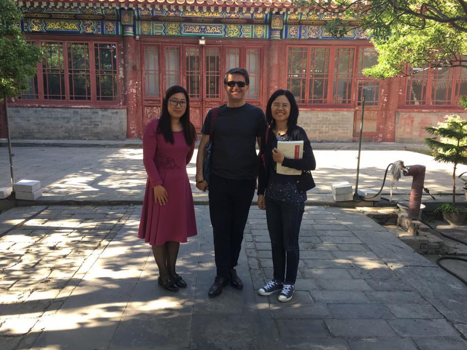 The SILC delegation receives a tour of the Forbidden City with the Director of Museum Studies