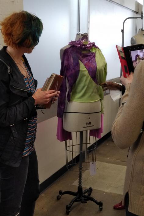 A designer in ASU's Fashion Lab shows the early stages of a Power Play costume