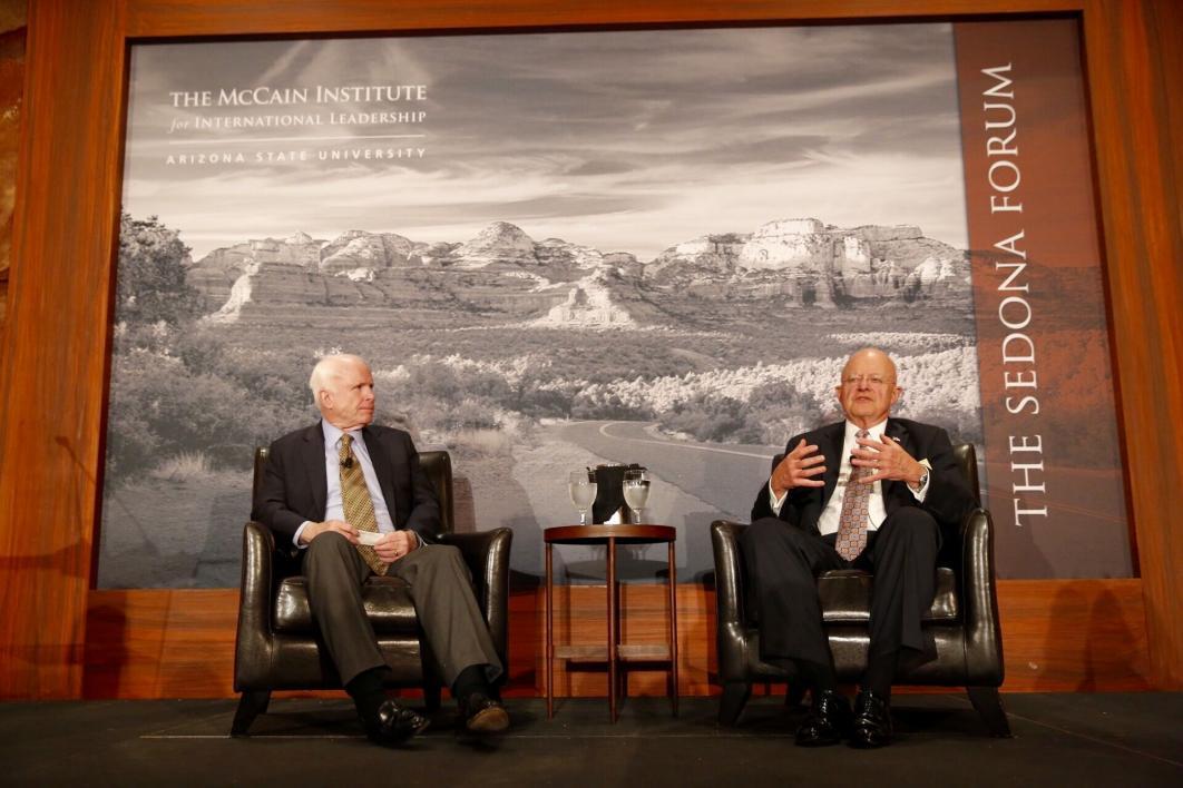 A photograph of Senator John McCain and the Director of National Intelligence James Clapper