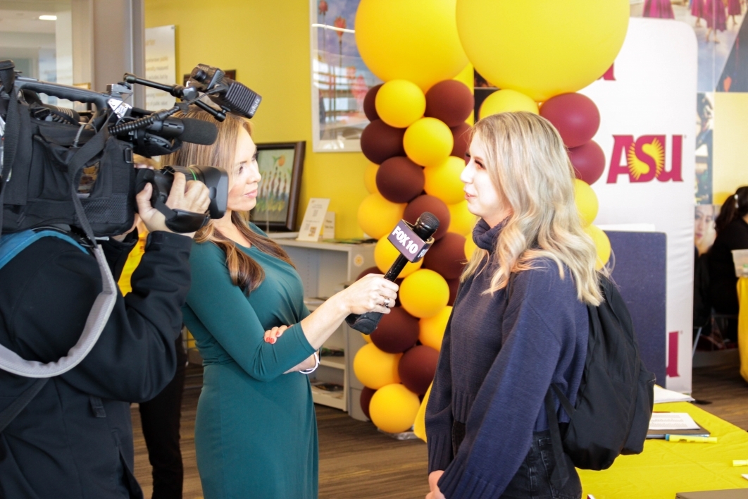 Meghan Crisan being interviewed by Fox 10 news.