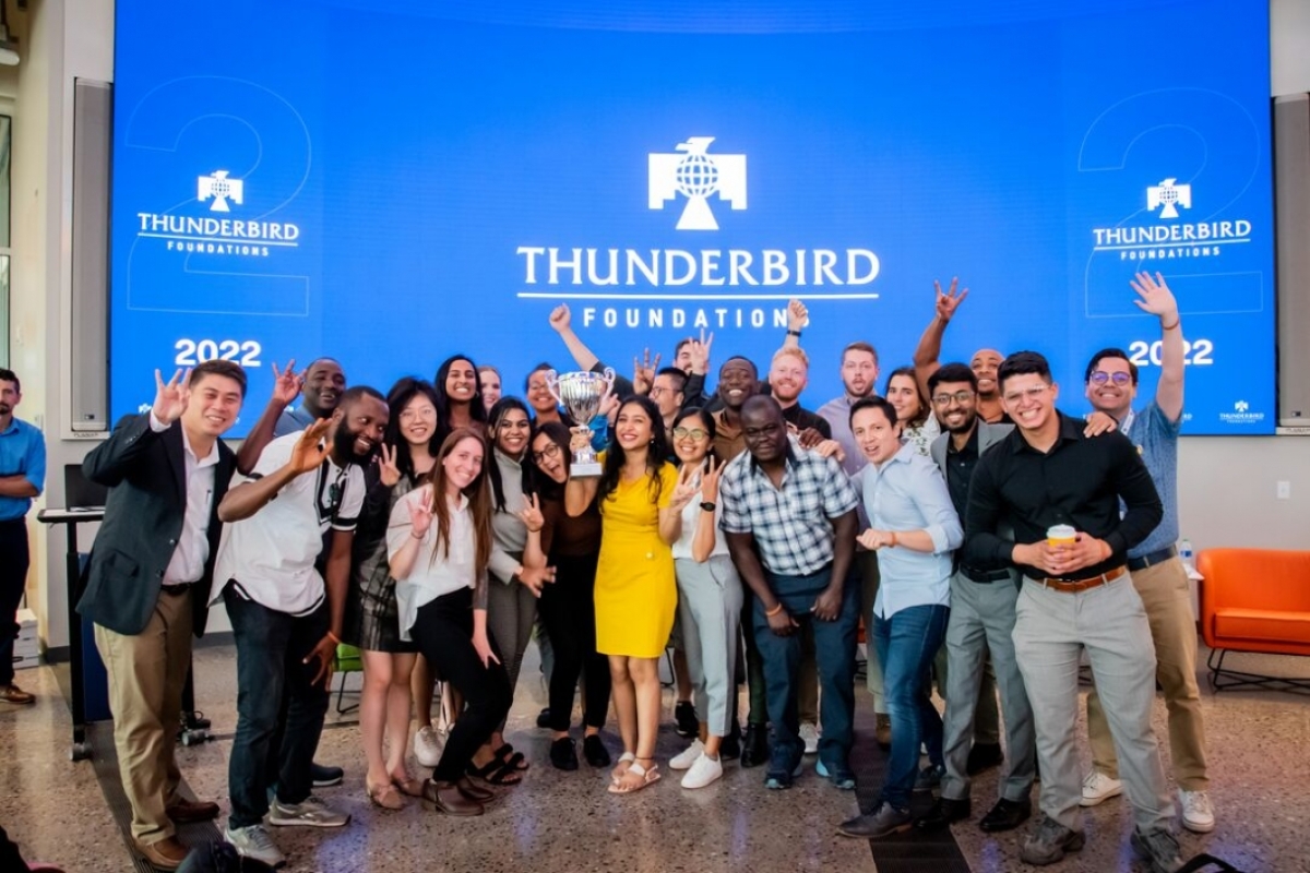 Group of students pose for a photo at Foundations, Thunderbird's new student orientation event.
