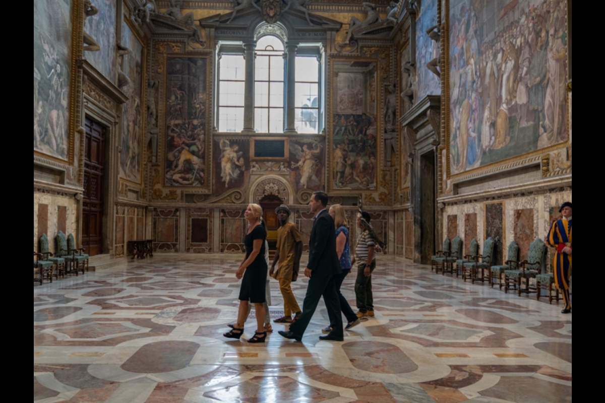 People walking through the Vatican.