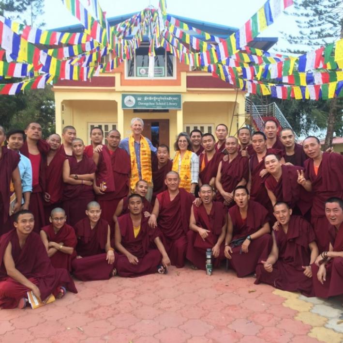 group of Buddhist monks and writing instructors