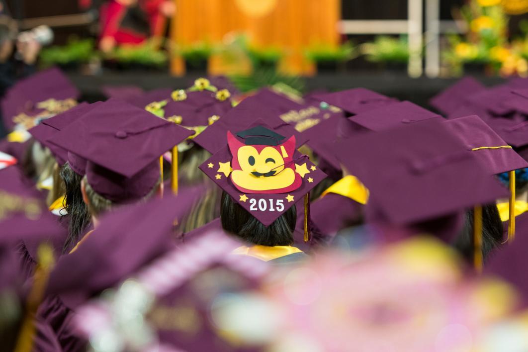 A graduation with a cartoon picture of Sparky